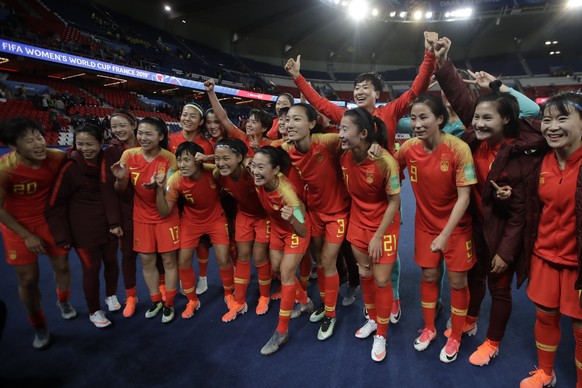 China players celebrate at the end of the Women&#039;s World Cup Group B soccer match between China and South Africa at Parc des Princes in Paris, France, Thursday, June 13, 2019. China won 1-0. (AP P ...