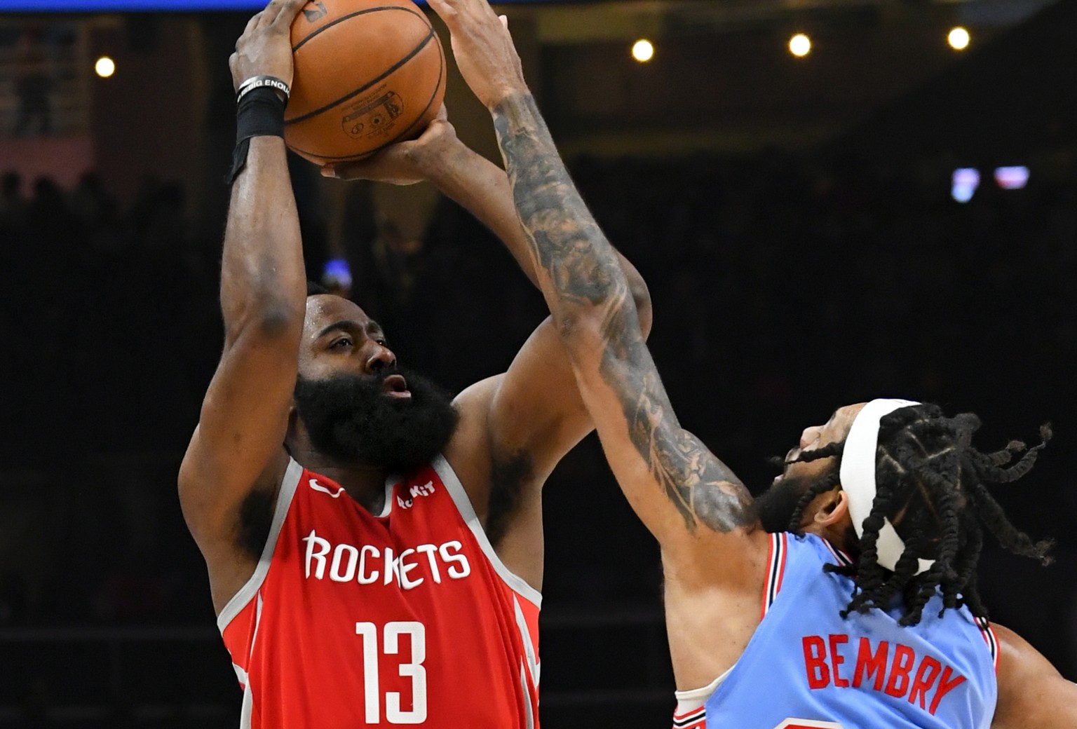 Houston Rockets guard James Harden (13) shoots as Atlanta Hawks forward DeAndre&#039; Bembry defends during the second half of an NBA basketball game Tuesday, March 19, 2019, in Atlanta. Houston won 1 ...