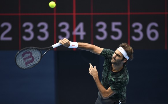 epa05706483 Roger Federer of Switzerland in action during a practice session ahead of the Australian Open tennis tournament on Rod Laver Arena in Melbourne, Victoria, Australia, 09 January 2017. The A ...
