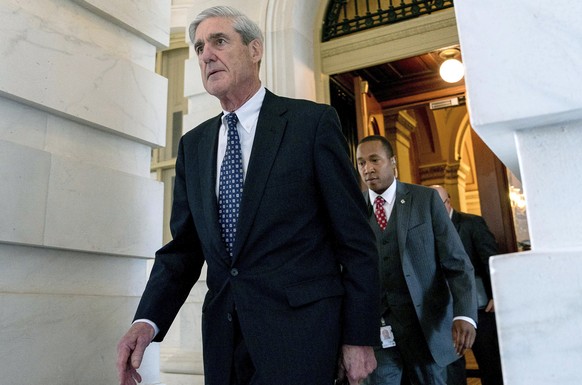 FILE - In this June 21, 2017, file photo, former FBI Director Robert Mueller, the special counsel probing Russian interference in the 2016 election, departs Capitol Hill following a closed door meetin ...