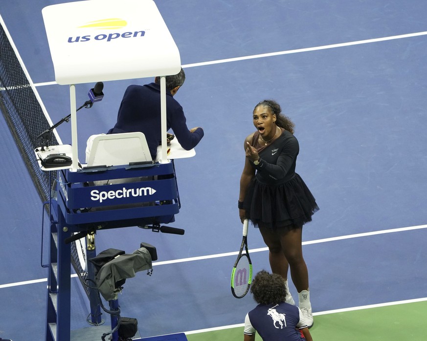 Serena Williams argues with the chair umpire during a match against Naomi Osaka, of Japan, during the women&#039;s finals of the U.S. Open tennis tournament at the USTA Billie Jean King National Tenni ...