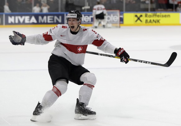 Switzerland&#039;s Ramon Untersander celebrates after winning the Ice Hockey World Championships group B match between Canada and Switzerland in the AccorHotels Arena in Paris, France, Saturday, May 1 ...