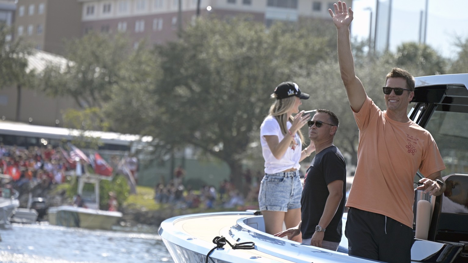 Tampa Bay Buccaneers NFL football quarterback Tom Brady waves to fans as he celebrates their Super Bowl 55 victory over the Kansas City Chiefs with a boat parade in Tampa, Fla., Wednesday, Feb. 10, 20 ...