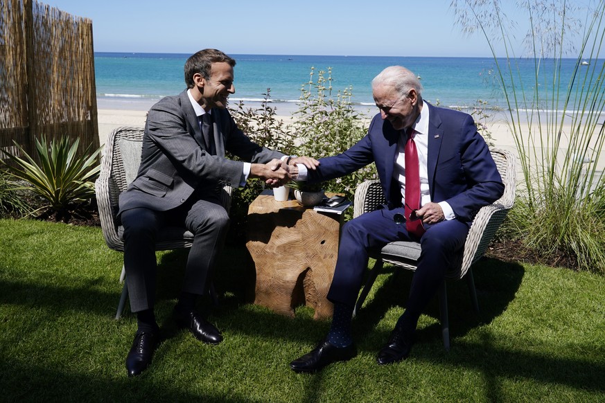 President Joe Biden and French President Emmanuel Macron visit during a bilateral meeting at the G-7 summit, Saturday, June 12, 2021, in Carbis Bay, England. (AP Photo/Patrick Semansky)
Joe Biden