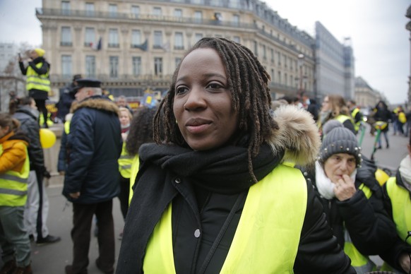 Priscillia Ludosky one of the leader of the yellow vests movement march during a protest in Paris, Sunday, Jan. 6, 2019. Several hundred women wearing yellow vests march during a rally in Paris to giv ...