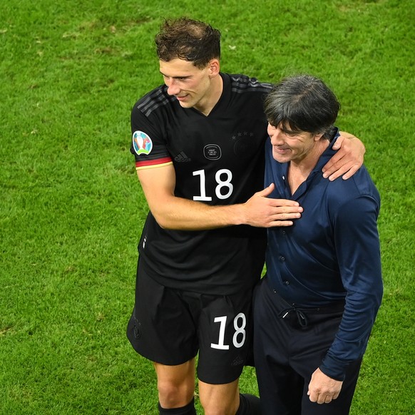 epa09297475 German head coach Joachim Loew (R) celebrates with midfielder Leon Goretzka after the UEFA EURO 2020 group F preliminary round soccer match between Germany and Hungary in Munich, Germany,  ...
