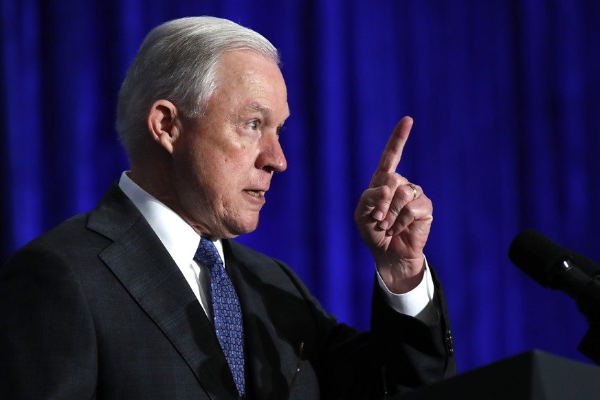FILE - In this June 21, 2017 file photo, Attorney General Jeff Sessions speaks in Bethesda, Md. Sessions is visiting the Guantanamo Bay detention facility, which he has called a fine place to house ne ...