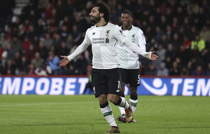 Liverpool&#039;s Mohamed Salah celebrates scoring his side&#039;s third goal against Bournemouth during the English Premier League soccer match at the Vitality Stadium in Bournemouth, England, Sunday  ...