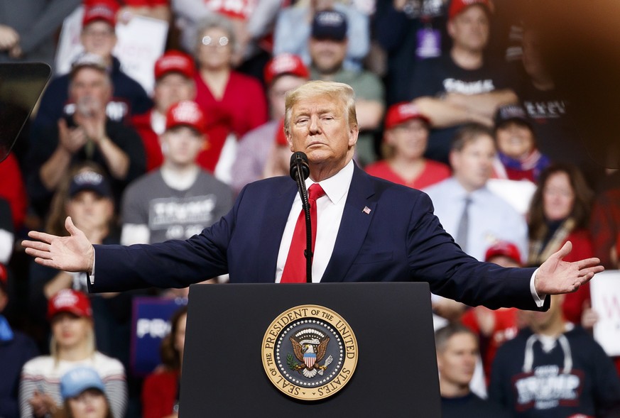 epa08210053 US President Donald Trump speaks during an election rally before the New Hampshire Primary at Southern New Hampshire University Arena in Manchester, New Hampshire, USA, 10 February 2020. T ...