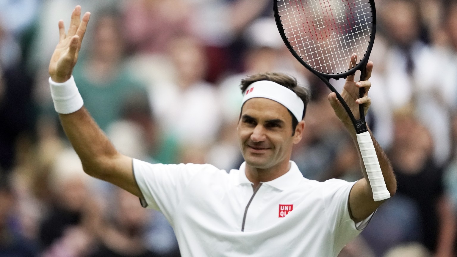 epa07704142 Roger Federer of Switzerland celebrates his win over Matteo Berrettini of Italy in their fourth round match during the Wimbledon Championships at the All England Lawn Tennis Club, in Londo ...