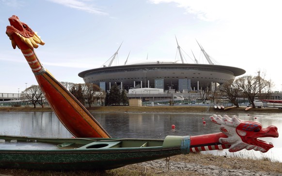epa08300172 Dragon boats in front of the Saint-Petersburg Arena in St. Petersburg, Russia, 17 March 2020. The UEFA meet on 17 March 2020 to discuss the effects of the coronavirus COVID-19 pandemic on  ...