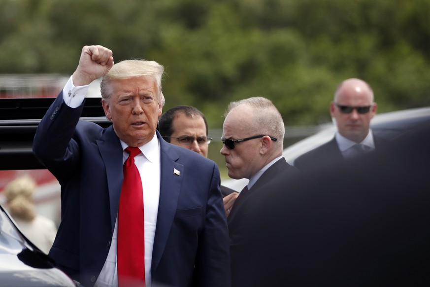 President Donald Trump gestures as he arrives at Kennedy Space Center, Saturday, May 30, 2020, Cape Canaveral, Fla. Trump is at Kennedy Space Center for the SpaceX Falcon 9 Launch. (AP Photo/Alex Bran ...