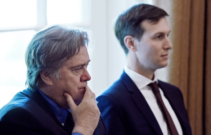 epa06150305 (FILE) - Jared Kushner (R) and Steve Bannon (L), two of President Trump&#039;s top advisers, listen during during a Cabinet meeting in the Cabinet Room of the White House, in Washington, D ...