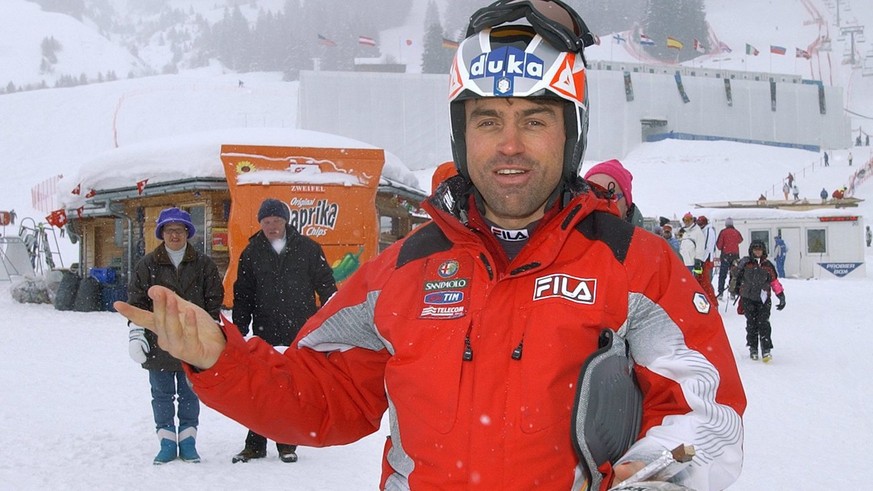 Italian ski racer Kristian Ghedina reacts after the downhill training on the &quot;Silvano Beltrametti&quot; race track was cancelled due to fog and snowfall one day before the Alpine Ski World Cup fi ...