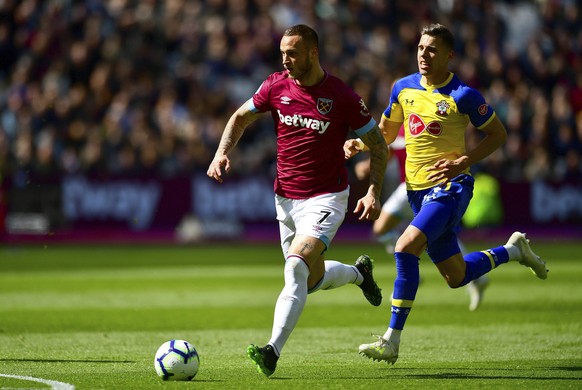 West Ham United&#039;s Marko Arnautovic, left, in action during their English Premier League soccer match against Southampton at London Stadium in London, Saturday, May 4, 2019. (Victoria Jones/PA via ...
