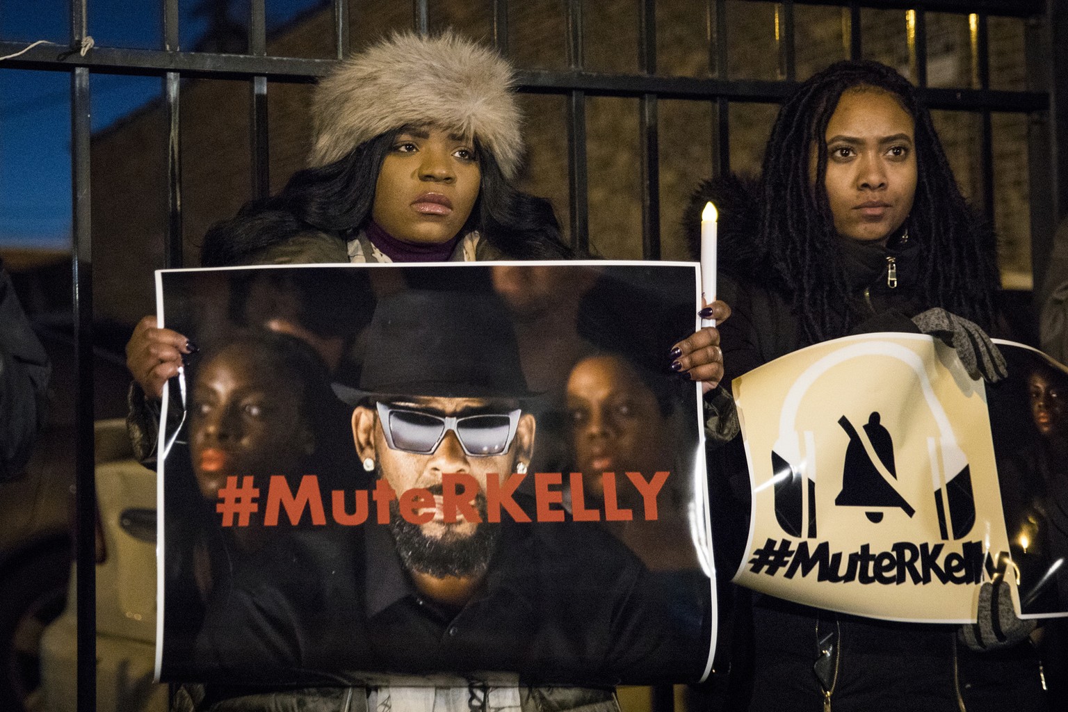 #MuteRKelly supporters protest outside R. Kelly&#039;s studio, Wednesday, Jan. 9, 2019 in Chicago. Lifetime&#039;s &quot;Surviving R. Kelly&quot; series which aired earlier this month, looks at the si ...