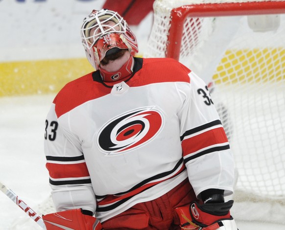 Carolina Hurricanes goalie Scott Darling reacts after giving up a goal to St. Louis Blues&#039; Scottie Upshall during the third period of an NHL hockey game Saturday, Dec. 30, 2017, in St. Louis. (AP ...
