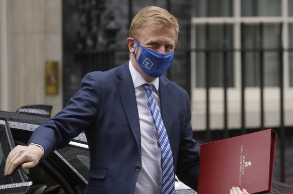 Secretary of State for Digital, Culture, Media and Sport of the United Kingdom Oliver Dowden arrives at 10 Downing Street in London, Wednesday, Jan. 13, 2021. (AP Photo/Kirsty Wigglesworth)
