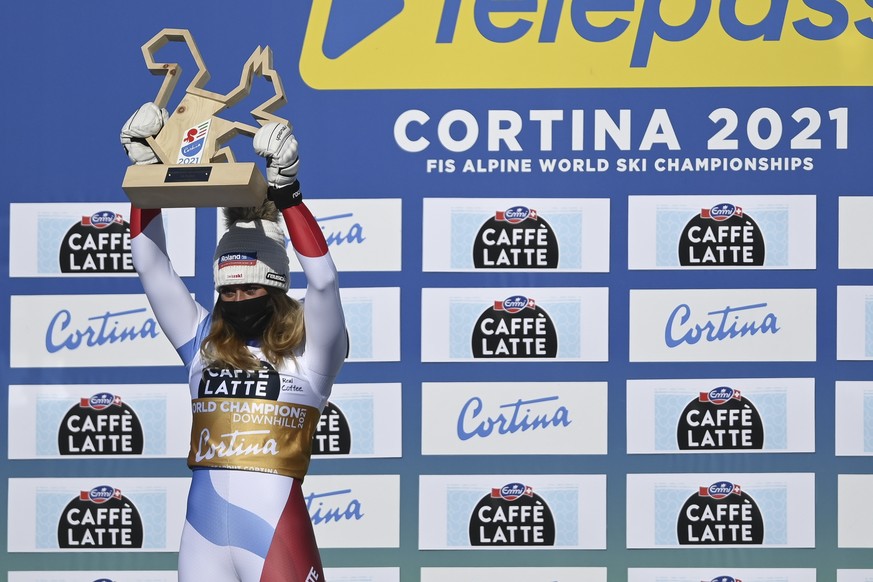 epa09008727 Winner Corinne Suter of Switzerland celebrates with her trophy during the award ceremony of the Women&#039;s Downhill race at the FIS Alpine Skiing World Championships in Cortina d&#039;Am ...