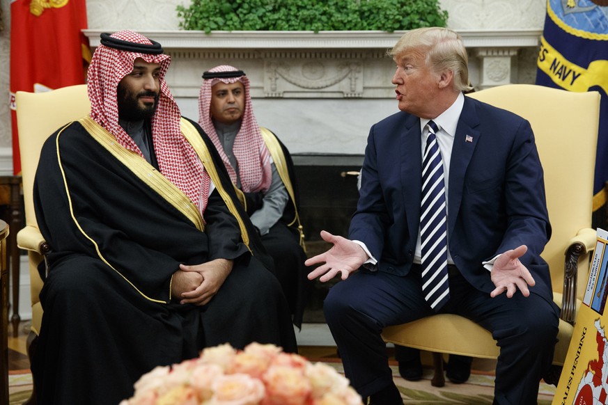 FILE - In this March 20, 2018, file photo, President Donald Trump meets with Saudi Crown Prince Mohammed bin Salman in the Oval Office of the White House in Washington. The prince and Trump are attend ...