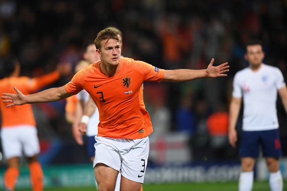 epa07631385 Matthijs de Ligt of the Netherlands celebrates after scoring the 1-1 equalizer during the UEFA Nations League semi final soccer match between the Netherlands and England at D. Afonso Henri ...