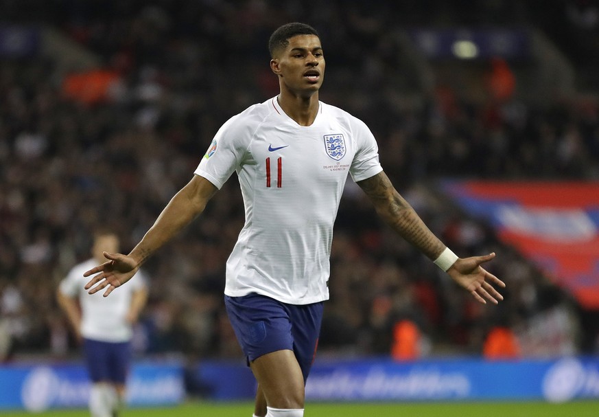 England&#039;s Marcus Rashford celebrates scoring his side&#039;s fourth goal during the Euro 2020 group A qualifying soccer match between England and Montenegro at Wembley stadium in London, Thursday ...