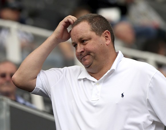FILE - In this Sunday, Aug. 9, 2015 file photo, Newcastle United&#039;s owner Mike Ashley looks on from the stands during their English Premier League soccer match between Newcastle United and Southam ...