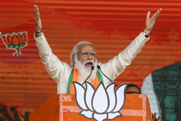 FILE - In this March 7, 2021, file photo, Indian Prime Minister Narendra Modi addresses a public rally ahead of West Bengal state elections in Kolkata, India. India