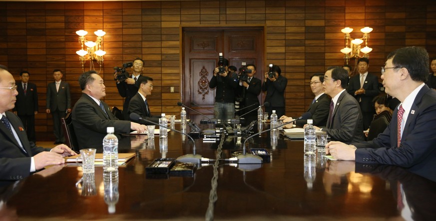 epa06635178 South Korean Unification Minister and chief delegate Cho Myoung-gyon (2-R) talks with North Korea&#039;s chief delegate Ri Son-gwon (2-L) during their meeting at the Tongilgak building on  ...