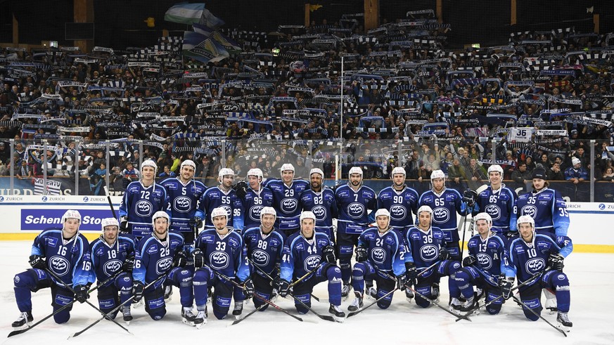epa08091008 Ambri players pose after the game between HC Ambri-Piotta and Salavat Yulaev Ufa, at the 93th Spengler Cup ice hockey tournament in Davos, Switzerland, 26 December 2019. EPA/GIAN EHRENZELL ...