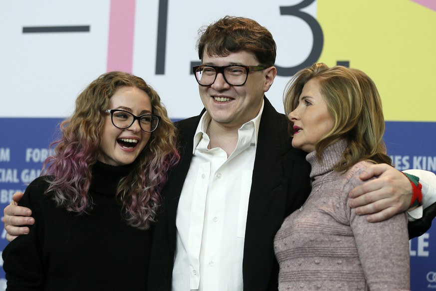 epa08250056 (L-R) Olga Shkabarnya, Russian director Ilya Khrzhanovskiy and Natalia Berezhnaya attends the press conference for &#039;DAU. Natasha&#039; during the 70th annual Berlin International Film ...