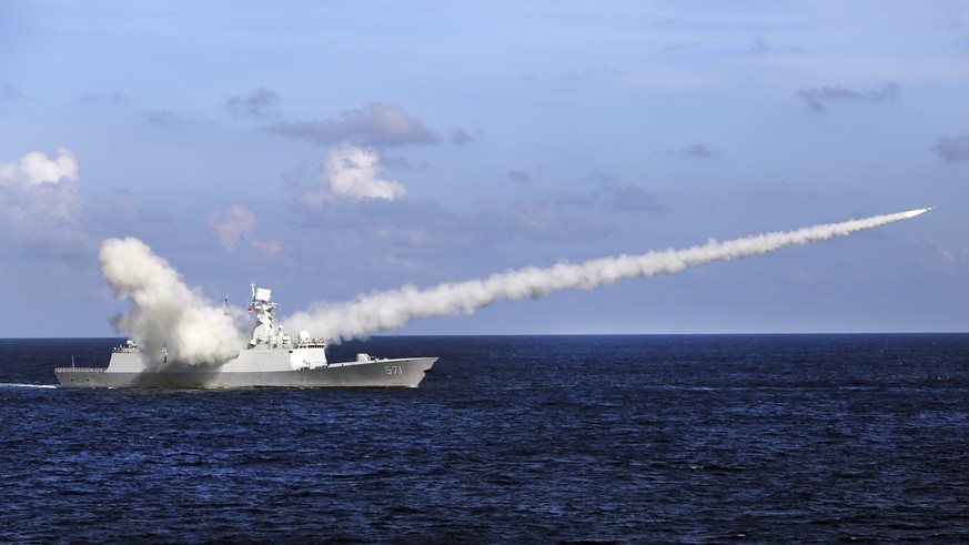 FILE - In this July 8, 2016, file photo released by Xinhua News Agency, Chinese missile frigate Yuncheng launches an anti-ship missile during a military exercise in the waters near south China&#039;s  ...