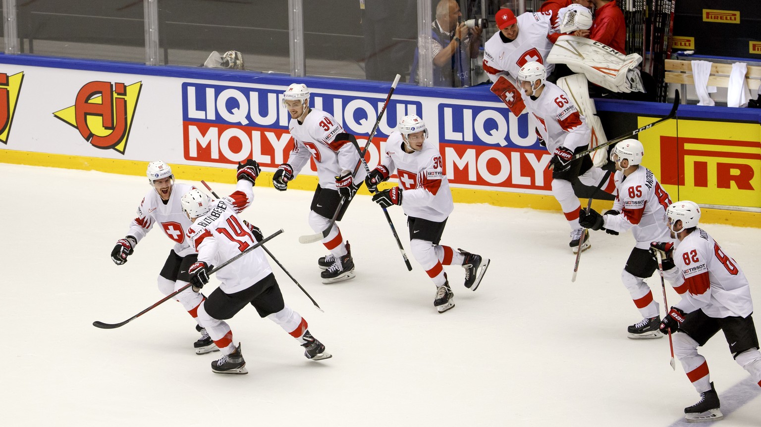 Switzerland&#039;s players celebrate their victory after beating Finland, during the IIHF 2018 World Championship quarter final game between Finland and Switzerland, at the Jyske Bank Boxen, in Hernin ...