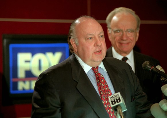 FILE - In this Jan. 30, 1996 file photo, Roger Ailes, left, speaks at a news conference as Rupert Murdoch looks on after it was announced that Ailes will be chairman and CEO of Fox News. Former Fox Ne ...