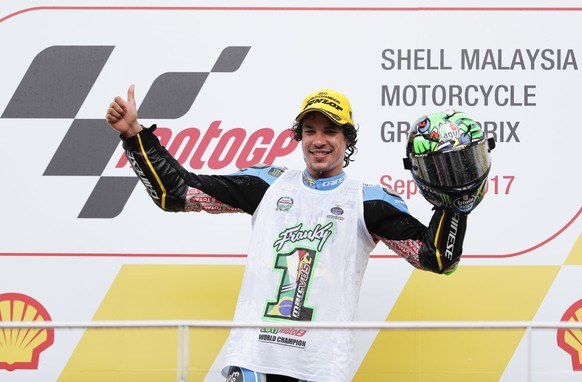 Italy&#039;s Franco Morbidelli celebrates after becoming this year&#039;s world champion after the race of the Malaysia Moto2 at the Sepang International circuit in Sepang, Malaysia, Sunday, Oct. 29,  ...