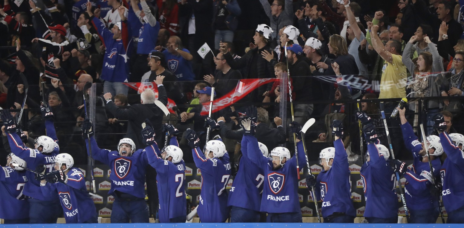 Players of France celebrate their sides fourth goal during the Ice Hockey World Championships group B match between France and Finland in the AccorHotels Arena in Paris, France, Sunday, May 7, 2017. ( ...