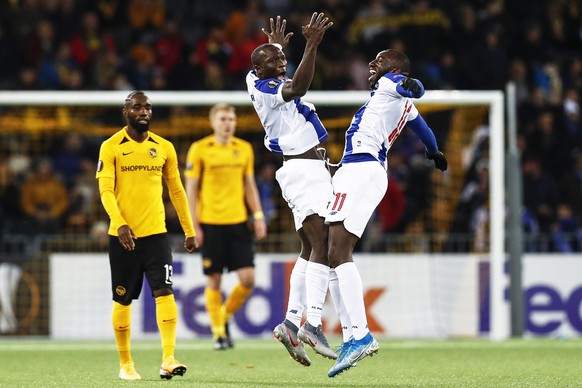 epa08031760 Porto&#039;s Vincent Aboubakar (2-R) celebrates with teammate Moussa Marega (R) after scoring the 1-1 equalizer during the UEFA Europa League group G soccer match between BSC Young Boys an ...