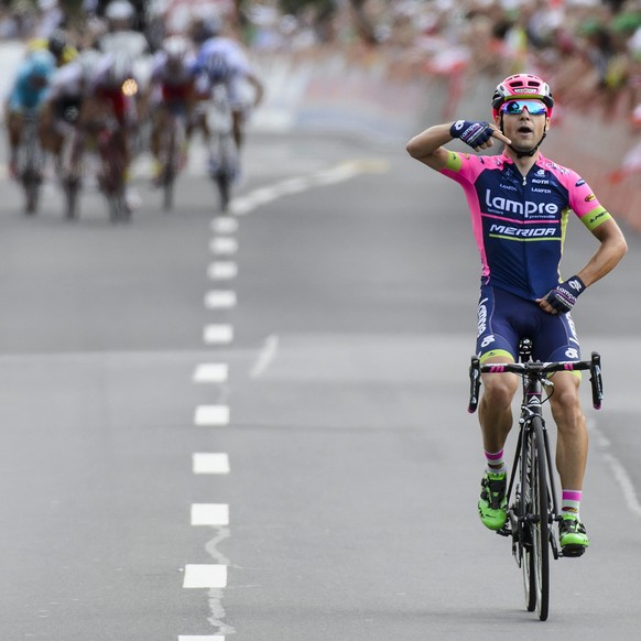 epa04799238 Kristijan Durasek from Croatia of team Lampre-Merida crosses the finish line to win the 2nd stage, a 161,1 km circuit race from Rotkreuz to Rotkreuz, at the 79th Tour de Suisse UCI ProTour ...