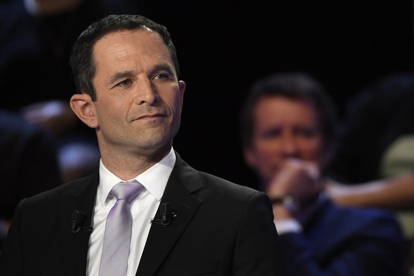 epa05888777 French presidential candidate left-wing French Socialist (PS) party Benoit Hamon attends a debate organized by French private TV channels BFM TV and CNews, between the eleven candidates fo ...