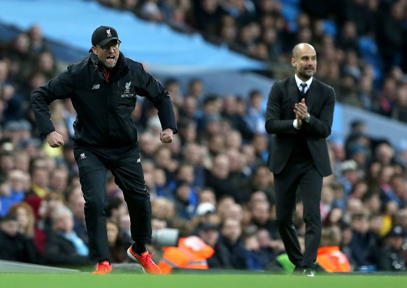 epa05858615 Manchester City&#039;s manager Pep Guardiola (R) and Liverpool&#039;s manager Juergen Klopp react during the English Premier League soccer match between Manchester City and Liverpooll at t ...