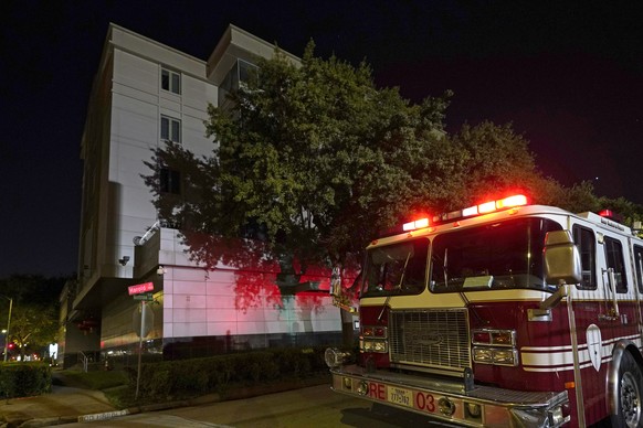 A firetruck is positioned outside the Chinese Consulate Wednesday, July 22, 2020, in Houston. Authorities responded to reports of a fire at the consulate. Witnesses said that people were burning paper ...