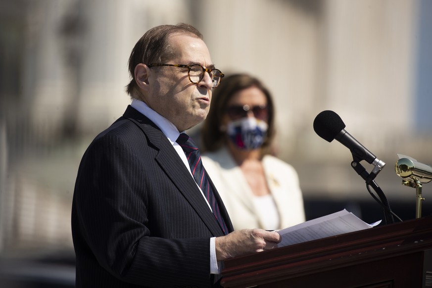 epa08508808 US House Judiciary Committee Chairman Jerry Nadler (L) speaks beside US Speaker of the House Nancy Pelosi (R) during a press event with House Democrats to discuss the George Floyd Justice  ...