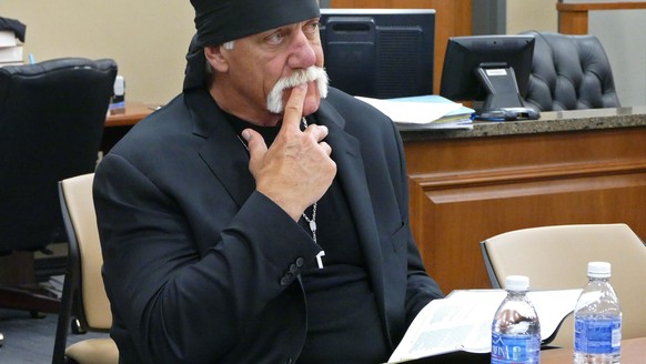 FILE -In this Tuesday, March 1, 2016 file photo, Terry Bollea, known as professional wrestler Hulk Hogan, watches potential jurors at the Pinellas County Courthouse, in St. Petersburg, Fla., as jury s ...