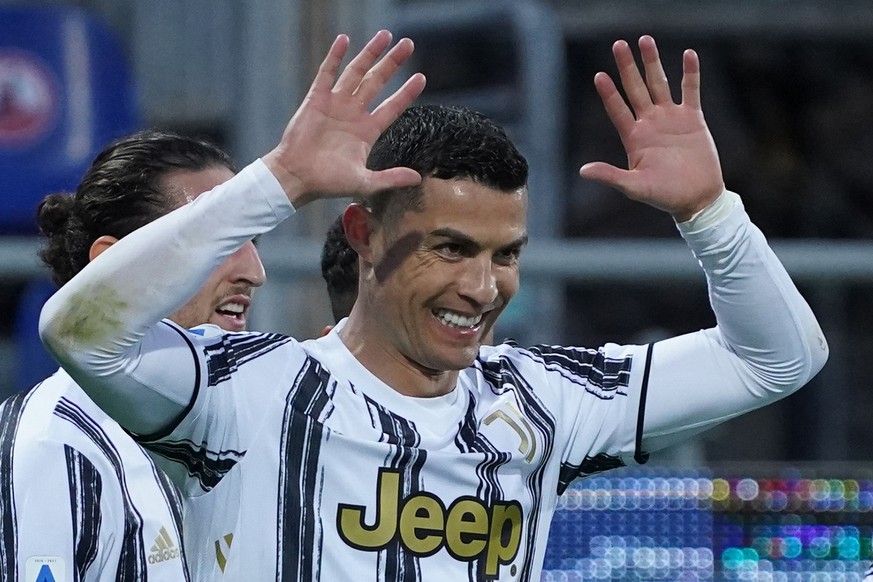 Juventus&#039; Cristiano Ronaldo celebrates after scoring his side&#039;s third goal for his personal hat trick in thirty minutes during the Italian Serie A soccer match between Cagliari and Juventus, ...