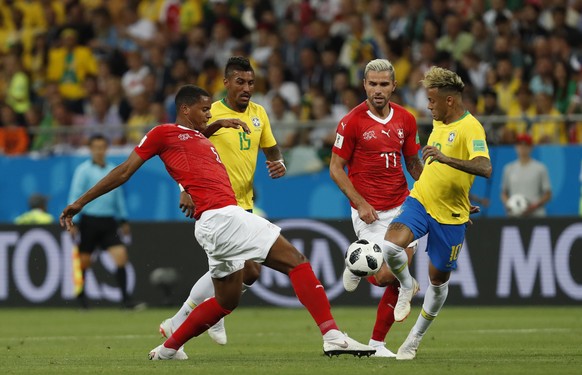 Brazil&#039;s Neymar, right, duels for the ball with Switzerland&#039;s Manuel Akanji during the group E match between Brazil and Switzerland at the 2018 soccer World Cup in the Rostov Arena in Rostov ...