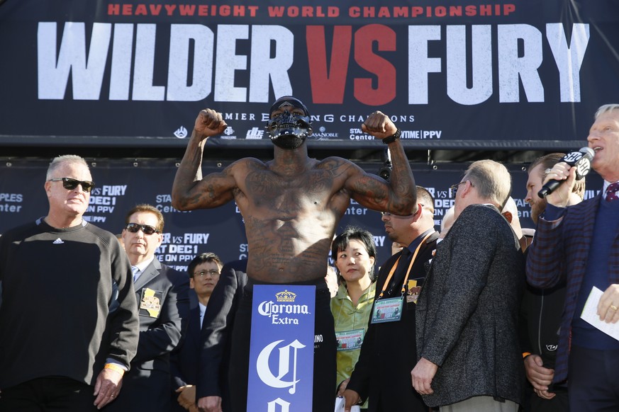WBC heavyweight titleholder boxer Deontay Wilder wears a mask during his official weigh-in ceremony Friday, Nov. 30, 2018, at Staples Center in Los Angeles, ahead of his bout against boxer Tyson Fury. ...