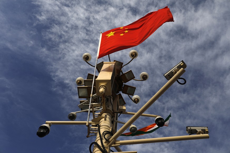 epa07621581 The Chinese national flag and surveillance cameras are seen on Tiananmen Square in Beijing, China, 30 May 2019 (issued 03 June 2019). This year, 04 June 2019 marks the 30th anniversary of  ...