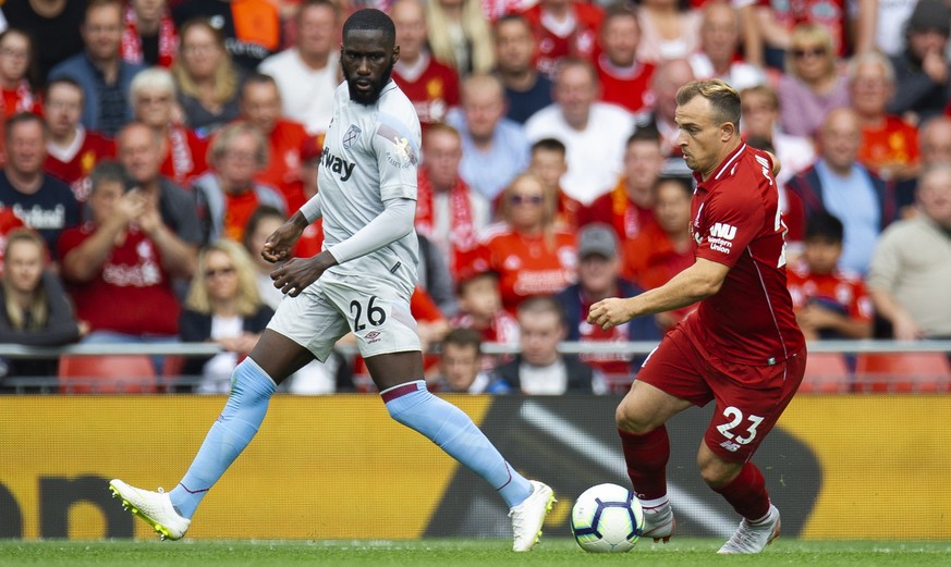 epa06945854 West Ham United&#039;s Arthur Masuaku (L) in action with Liverpool&#039;s Xherdan Shaqiri (R) during the English Premier League soccer match between Liverpool and West Ham at the Anfield i ...