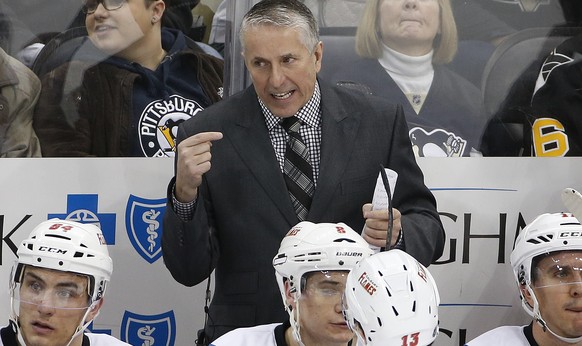 FILE - In this March 5, 2016 file photo, Calgary Flames head coach Bob Hartley gives instructions during an NHL hockey game against the Pittsburgh Penguins in Pittsburgh. The Flames have fired Bob Har ...