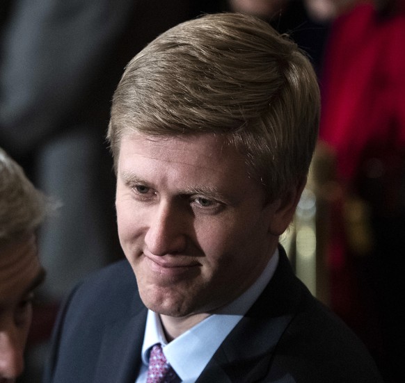 FILE - In a Monday, Dec. 3, 2018 file photo, Nick Ayers, right, listens as Supreme Court Associate Justice Neil Gorsuch waits for the arrival of the casket for former President George H.W. Bush to lie ...